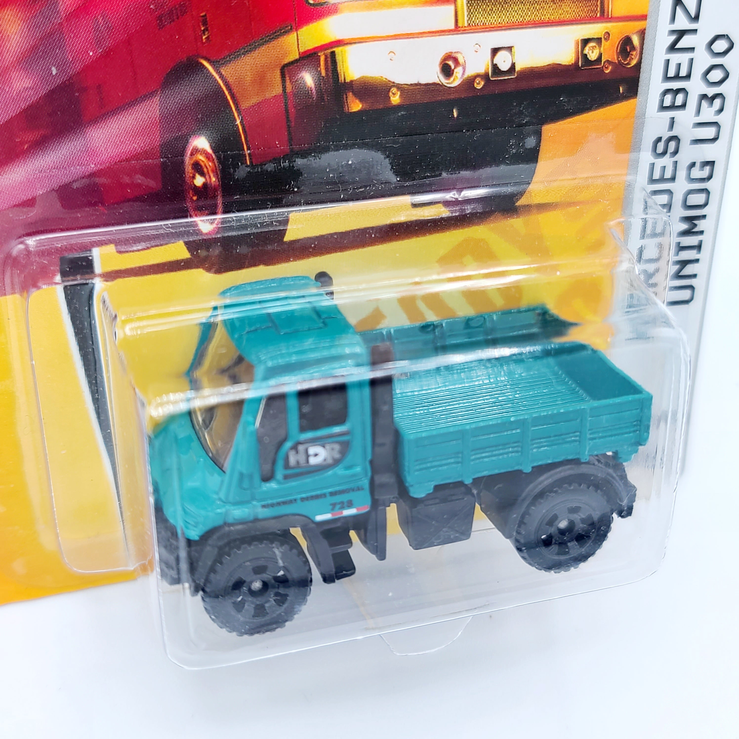 Matchbox Mercedes-Benz Unimog U300 (2009 MBX Basic - Highway Maintenance)